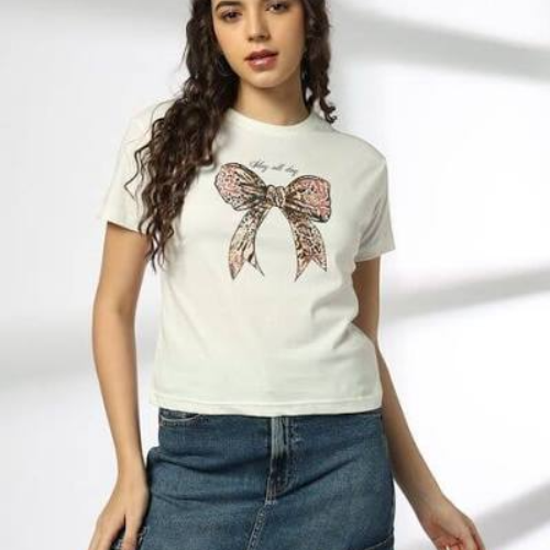 Olivia Clothing Store women's white bow print T-shirt styled with a casual denim skirt