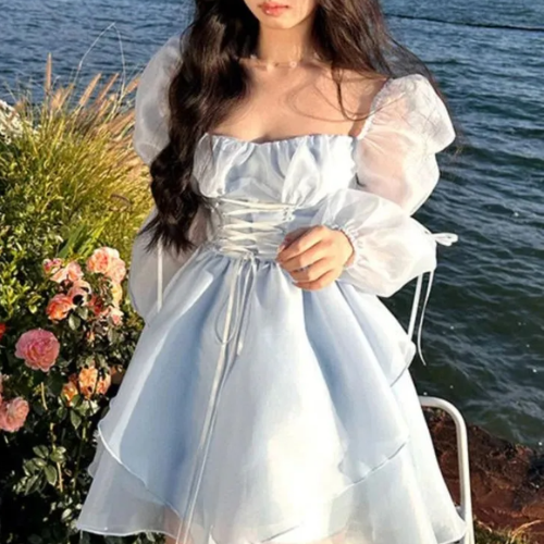 Olivia Clothing Store women's white puff sleeve mini dress with a stylish fitted design for summer fashion.
