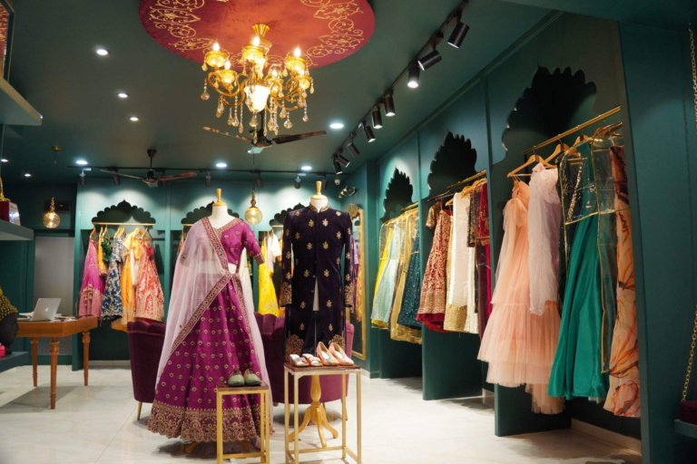Olivia Clothing Store showcasing elegant ethnic wear, designer lehengas, gowns, and traditional outfits in a modern fashion boutique with stylish interior and premium clothing collection