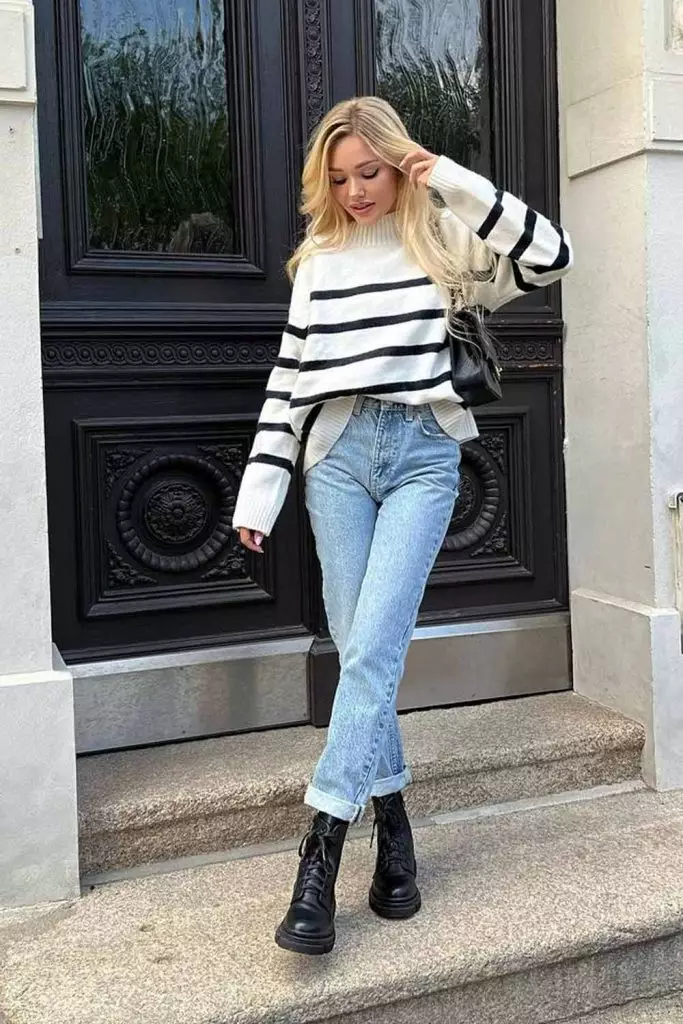 Olivia Clothing Store women's casual fashion collection featuring a striped sweater, high-waisted blue jeans, and black ankle boots for a stylish everyday outfit.