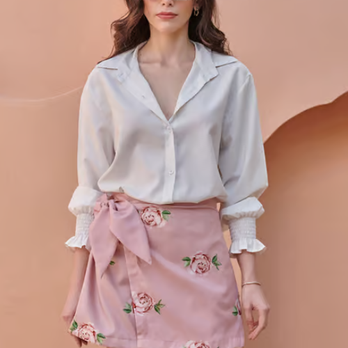 Olivia Clothing Store white blouse and pink floral skirt outfit.